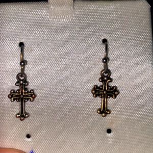 Cross dangling earrings